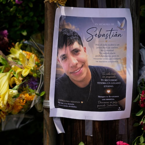 FILE - A poster of Johan Sebastián Durán Guerrero, a man killed by U.S. Immigration and Customs Enforcement, is displayed among flowers and tributes at a makeshift memorial in Biddeford, Maine, July 15, 2026. (AP Photo/Robert F. Bukaty, File)