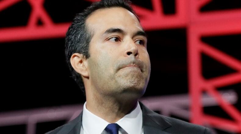 Texas Land Commissioner George P. Bush pauses while speaking to delegates at the Texas Republican Convention Thursday, May 12, 2016, in Dallas. (AP Photo/LM Otero)