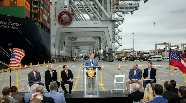 Gov. Brian Kemp, center, speaks during a visit to the Port of Savannah on March 25, 2024. The state's ports are a fast-growing channel of trade between Georgia and its international import and export markets. (GPA Photo/Stephen B. Morton)