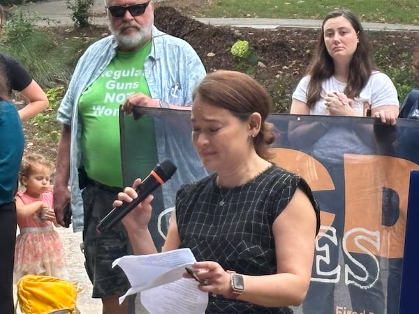 Dr. Elizabeth Soda, a Centers for Disease Control and Prevention employee, speaks during a press conference Sunday, Aug. 10, 2025, at Piedmont Park in Atlanta. (David Aaro/AJC)