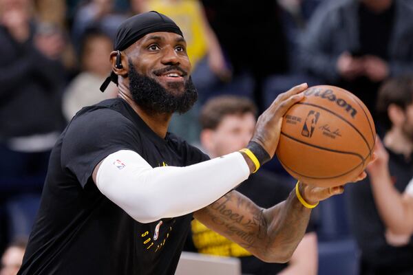 Los Angeles Lakers forward LeBron James warms up before an NBA basketball game against the Oklahoma City Thunder, Sunday, April 6, 2025, in Oklahoma City. (AP Photo/Nate Billings)