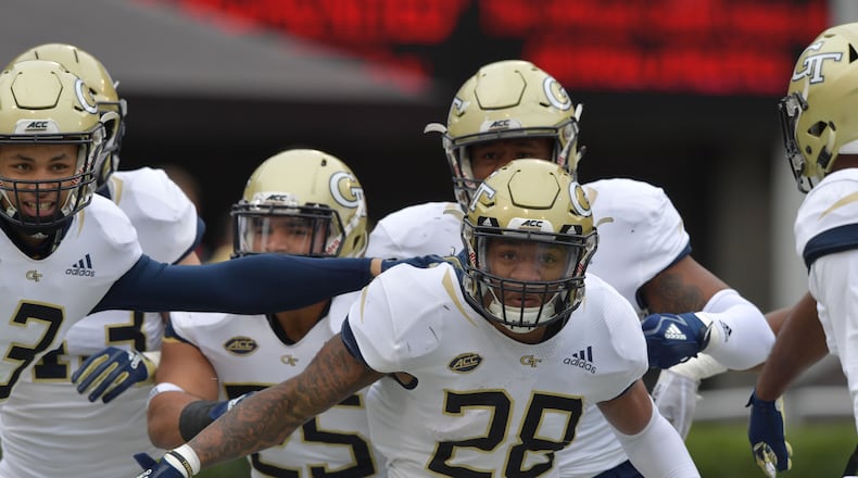 November 24, 2018 Athens - Georgia Tech defensive back Juanyeh Thomas (28) celebrates after he scored a touchdown during the second half in a NCAA college football game at Sanford Stadium on Saturday, November 24, 2018. Georgia won 45 - 21 over the Georgia Tech. HYOSUB SHIN / HSHIN@AJC.COM