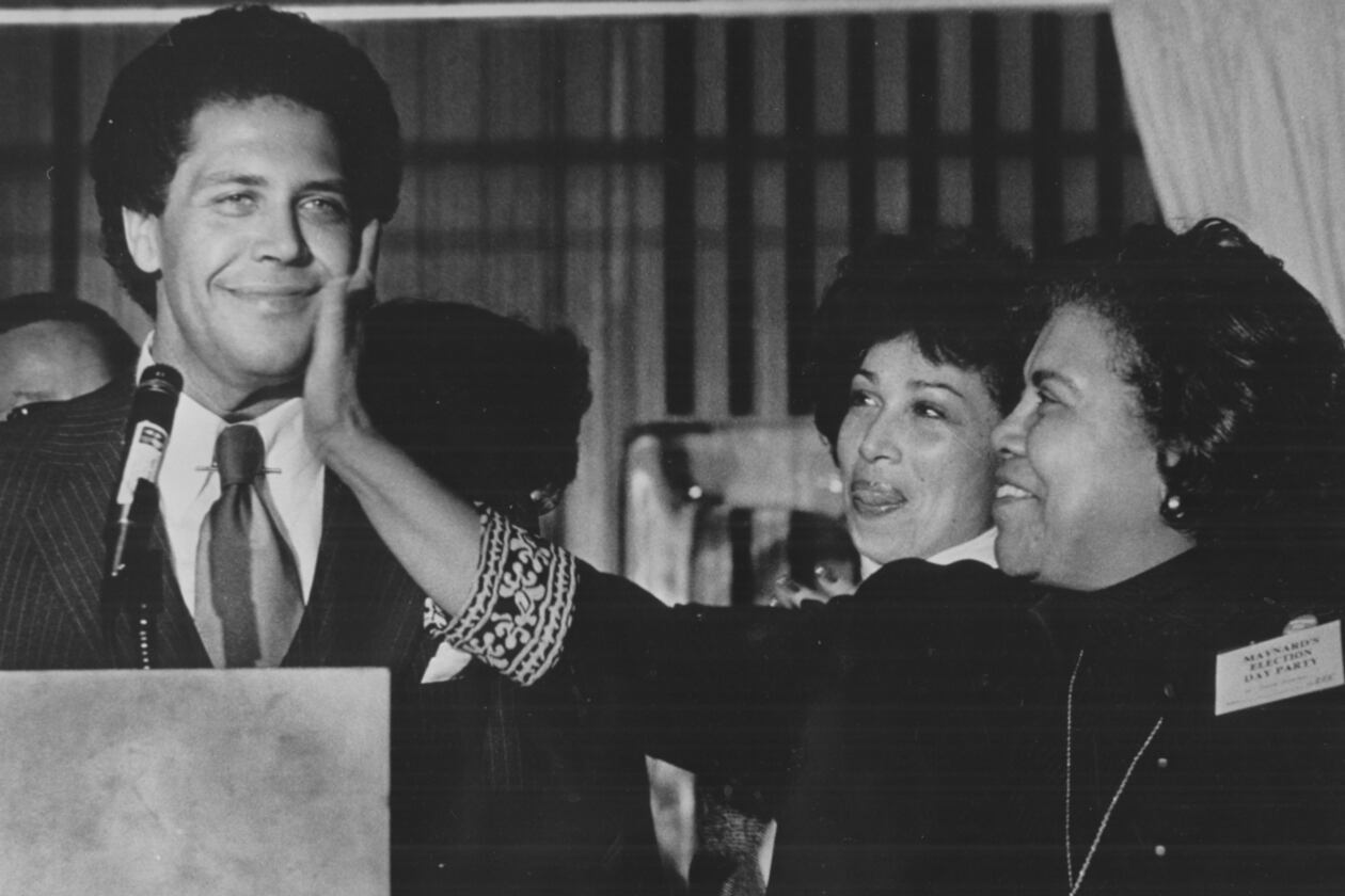 In the 1970s, Maynard Jackson is pictured here getting a love pat from his mom. AJC FILE PHOTO