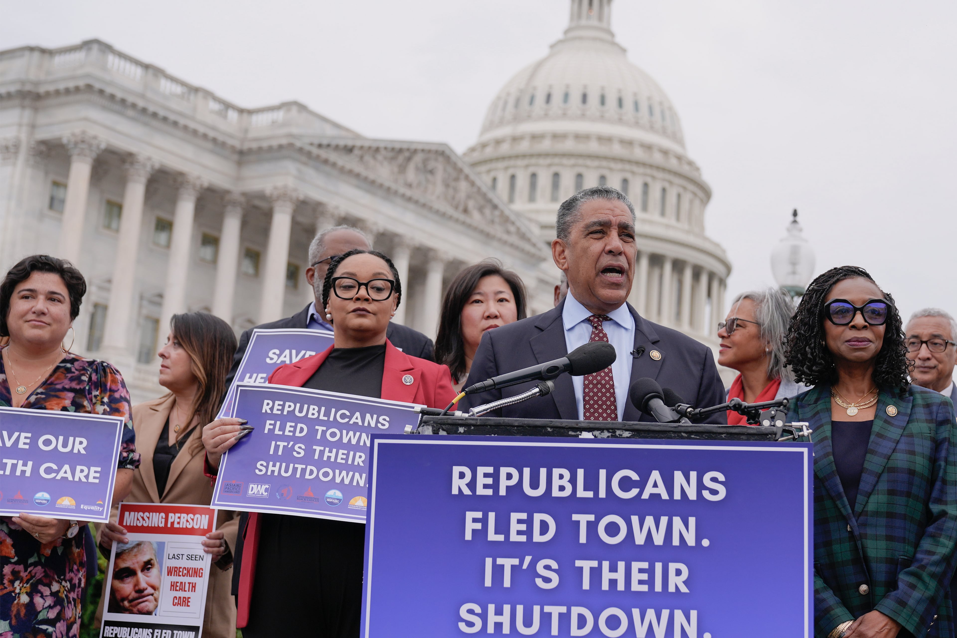 U.S. Rep. Adriano Espaillat (at microphone), D-N.Y., and other congressional Democrats blame Republicans for the government shutdown.