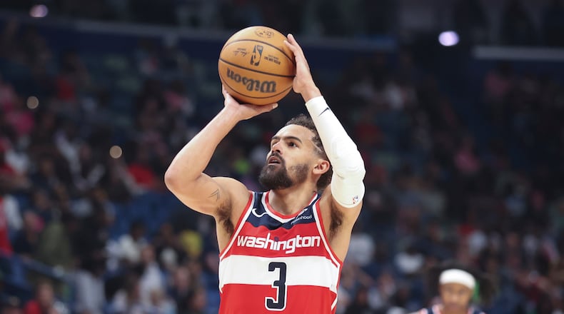 FILE - Washington Wizards guard Trae Young attempts a technical foul free throw against the New Orleans Pelicans in the second half of an NBA basketball game in New Orleans, March 8, 2026. (AP Photo/Peter Forest, File)