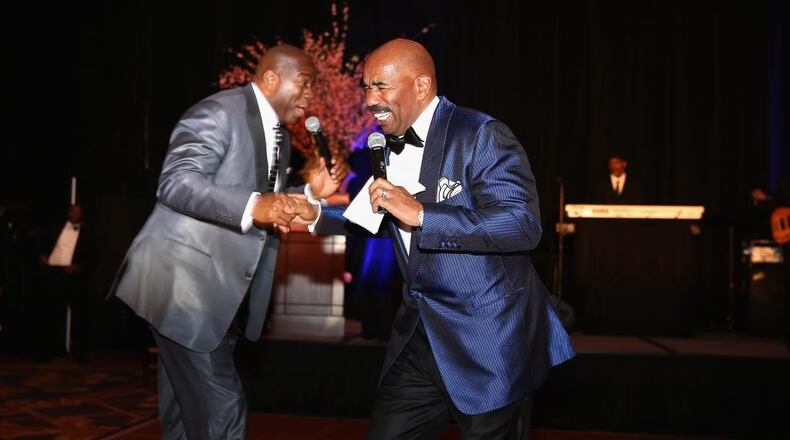 Magic Johnson and Steve Harvey at the The Steve & Marjorie Harvey Foundation's 2014 charitable gala.