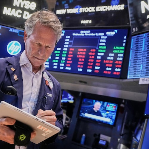 Trader Robert Charmak works on the floor of the New York Stock Exchange, Wednesday, Nov. 5, 2025. (AP Photo/Richard Drew)