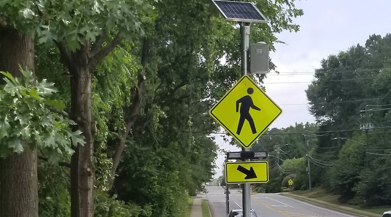 Roswell’s Transportation Department has installed the latest Rapid Rectangular Flashing Beacon on Crabapple Road at Haleys Pond. (Courtesy City of Roswell)