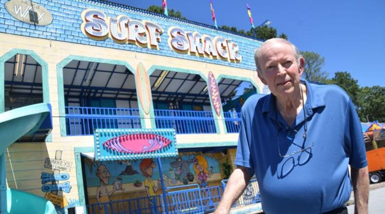Longtime Gwinnett County Fairgrounds Manager Dale Thurman stands in front of the Surf Shack attraction while it is being set up for the 2022 Gwinnett County Fair. (Photo Courtesy of Curt Yeomans)