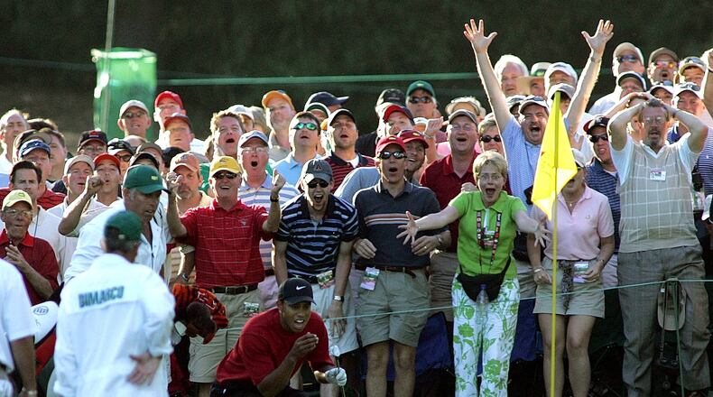 It's a rich tapestry of reaction as Tiger Woods urges his chip shot to drop on No. 16 during the final round of the 2005 Masters.