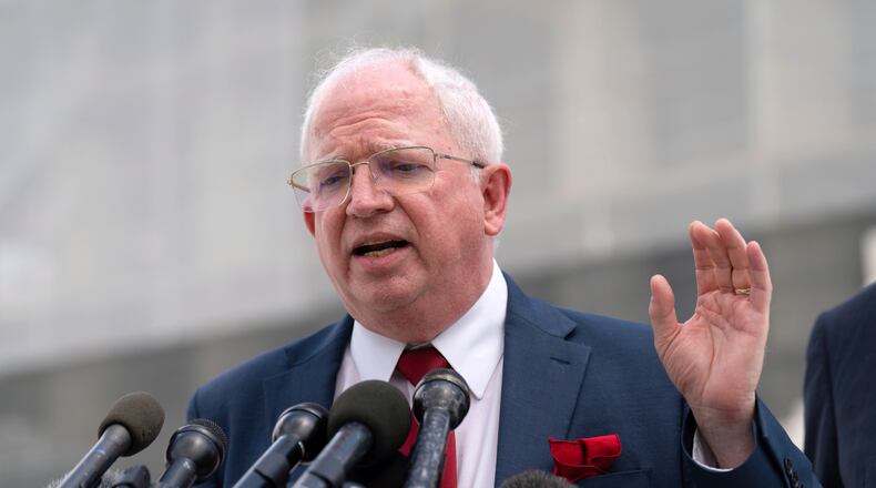 FILE - John Eastman, a California law professor, speaks to reporters after a Supreme Court hearing on birthright citizenship outside of the Supreme Court in Washington, May 15, 2025. (AP Photo/Jose Luis Magana, File)