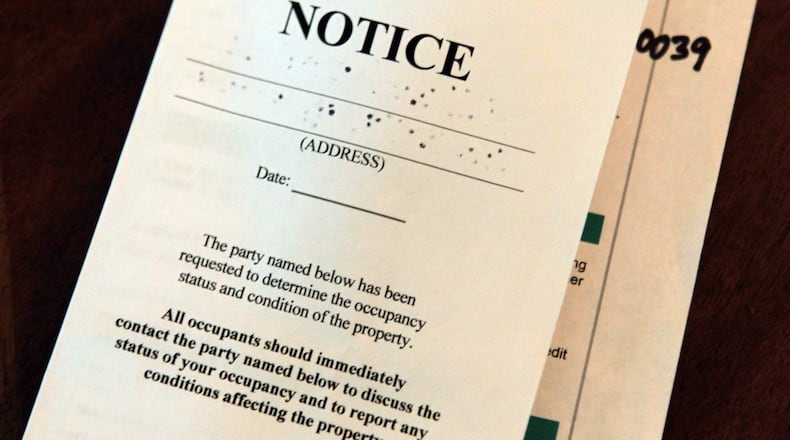 Foreclosures in Georgia typically happen on the local county’s courthouse steps n the first Tuesday of the month. With the nation in crisis, a group of advocates, religious groups and officials are asking Gov. Brian Kemp to suspend foreclosures — as well as evictions. (Jason Getz)