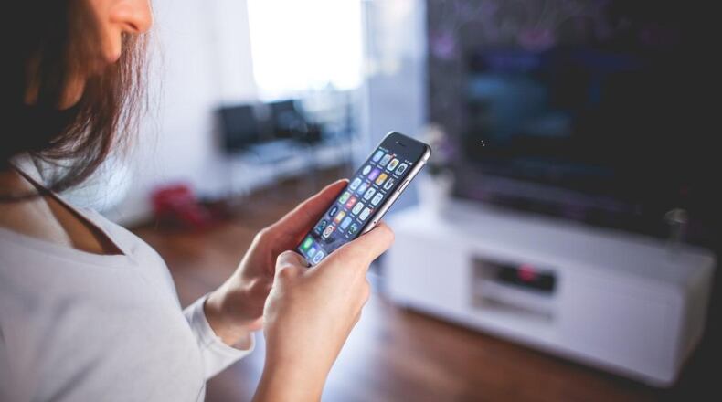 A woman checking her phone.