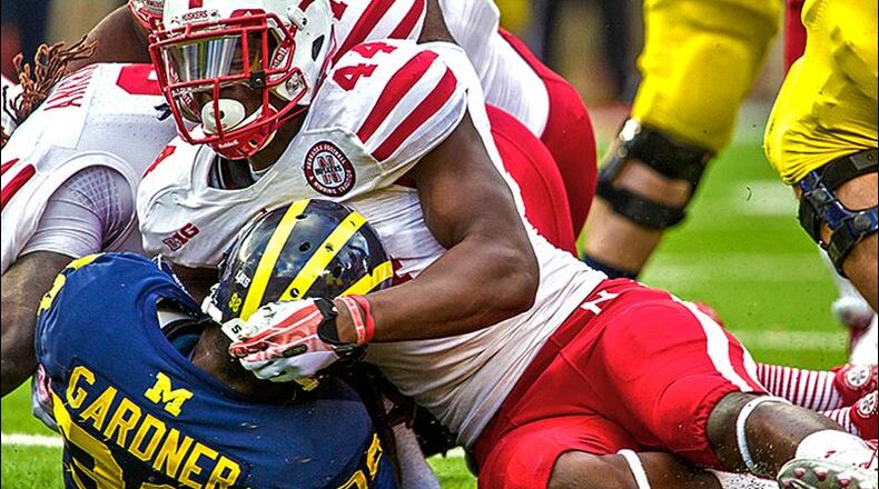 Nebraska defensive end Randy Gregory sacks Michigan’s Devin Gardner last season. ASSOCIATED PRESS