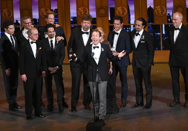 FILE - Jeffrey Seller, center, producer of the Broadway musical "Hamilton" accepts the award for best musical at the Tony Awards in New York on June 12, 2016. (Photo by Evan Agostini/Invision/AP, File)