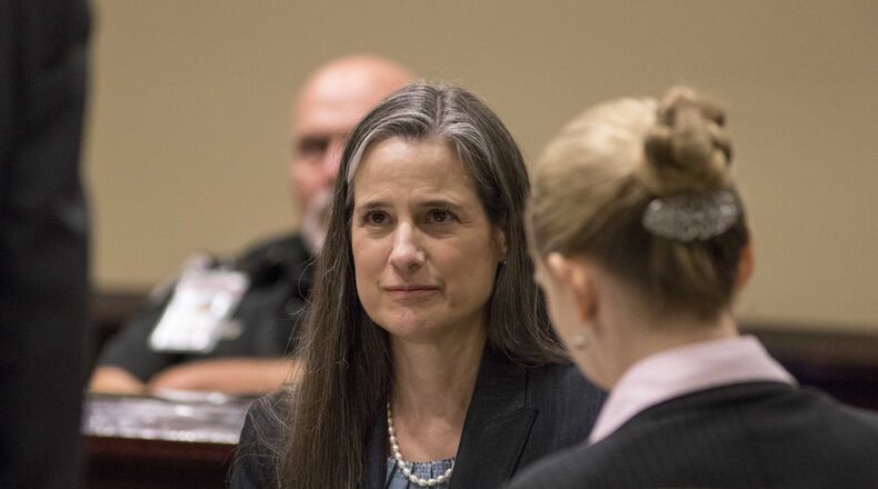 11/30/2017, Dawsonville, GA, - Nydia Tisdale sits with her lawyers during a trial at the Dawson Superior Court, Thursday, November 30, 2017. The trial involves Nydia Tisdale, a woman that was arrested at a Republican Party function in 2014 as she tried to videotape. ALYSSA POINTER/ALYSSA.POINTER@AJC.COM