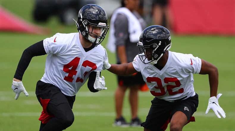 Falcons safety Parker Baldwin (left) works against cornerback Rashard Causey (right) during rookie minicamp on Friday, May 10, 2019, in Flowery Branch. Curtis Compton/ccompton@ajc.com
