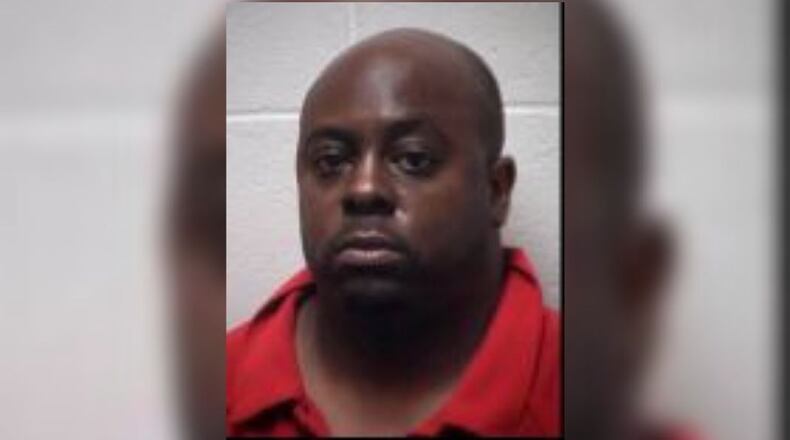 Larry Favors Jr, 39, was charged with murder in connection to the fatal shooting of Anthony Williams, 54, at Peachtree Peddlers antique mall, police said.
