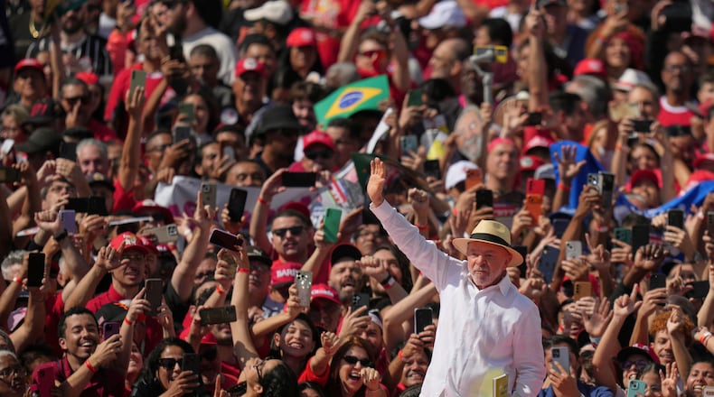 Brazilian President Luiz Inacio Lula da Silva waves to supporters during a presidential election campaign rally in Sao Bernardo do Campo, Sao Paulo state, Brazil, Sunday, Aug. 16, 2026. (AP Photo/Andre Penner)