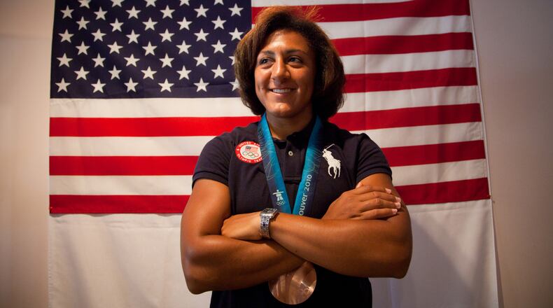 Olympic silver medalist bobsledder Elana Meyers talks with attendees at a fund-raiser in Douglasville Friday, Sept 10, 2010.
