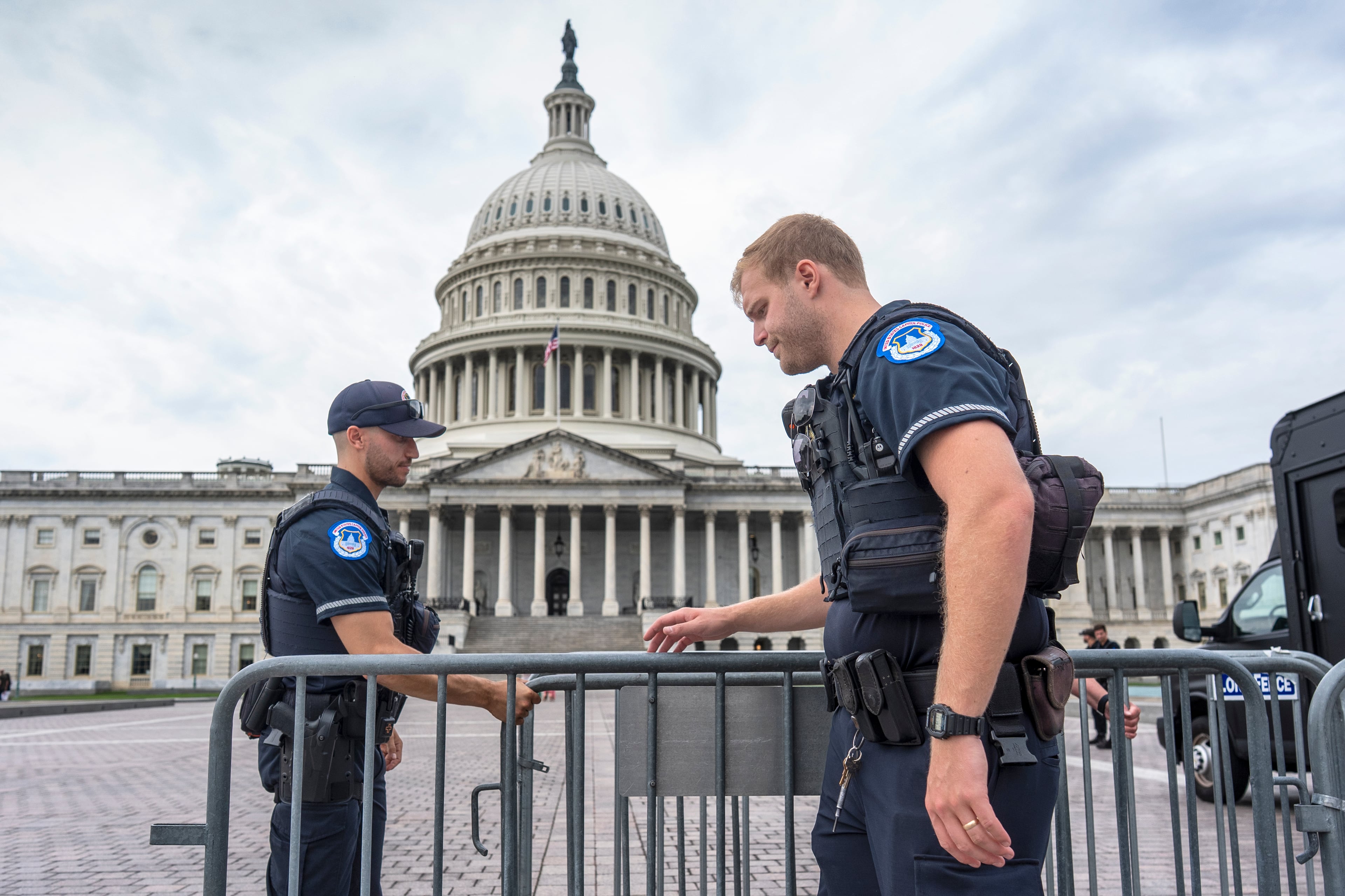 Capitol Police officers adjusted security barriers around the East Plaza at the Capitol in Washington on Wednesday.
