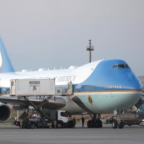 Catering trucks are parked at Air Force One on the tarmac as the motorcade carrying U.S. President Donald Trump arrives on the tarmac to depart following the NATO summit at Ankara International Airport in Ankara, Turkey, Wednesday, July 8, 2026. (AP Photo/Alex Brandon)