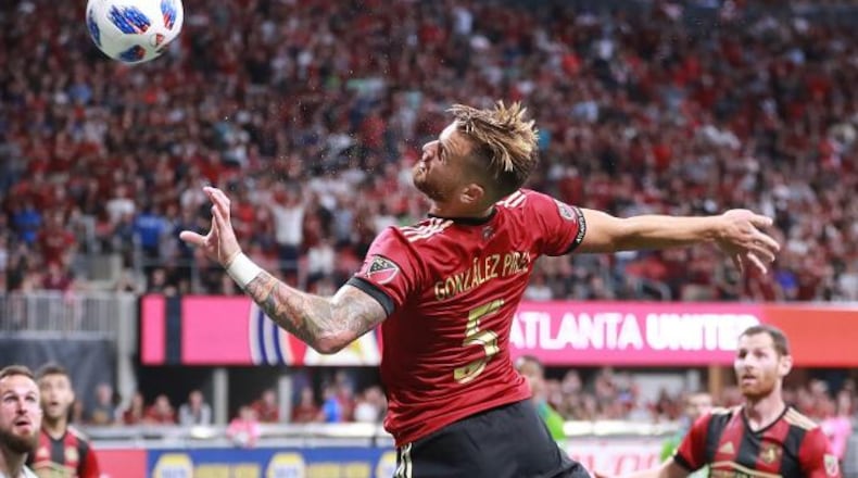 Atlanta United defender Leandro Gonzalez Perez has his header bounce off the goal post just missing a goal against the Seattle Sounders during the second half in a MLS soccer match on Sunday, July 15, 2018, in Atlanta.     Curtis Compton/ccompton@ajc.com