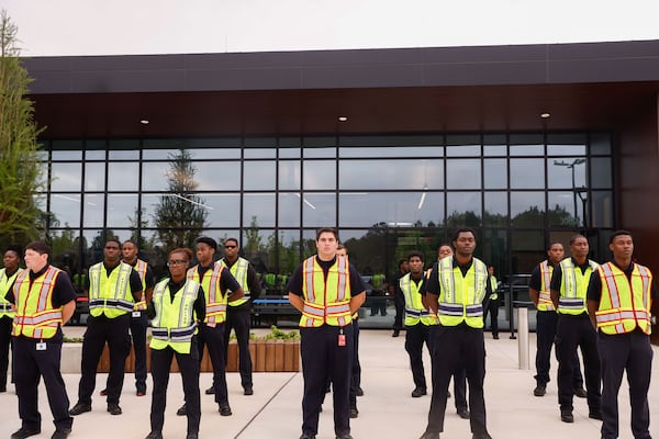 Atlanta police and fire recruits stand in front of the leadership building on the grounds of The Atlanta Public Safety Training Center. 