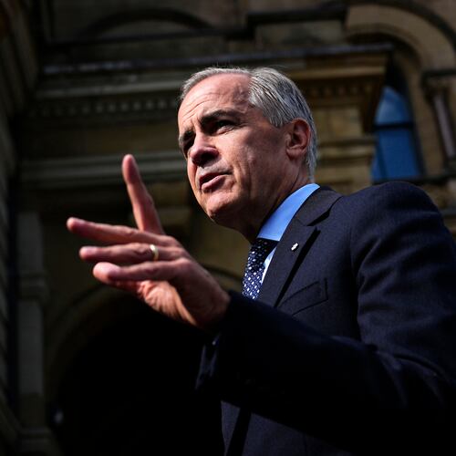 Canadian Prime Minister Mark Carney speaks with members of the media as he arrives at the Office of the Prime Minister and Privy Council in Ottawa, on Tuesday, Sept. 1, 2026. (Justin Tang/The Canadian Press via AP)