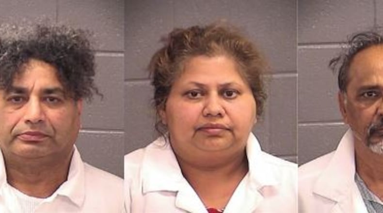 Khalid Mirza (from left), Uzma Mirza, Rajendra Oza (Credit: Spalding County Sheriff’s Office)