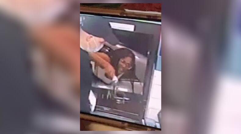 Deputies are searching for this woman, who is accused of throwing a bottle of feces and urine into a Taco Bell.
