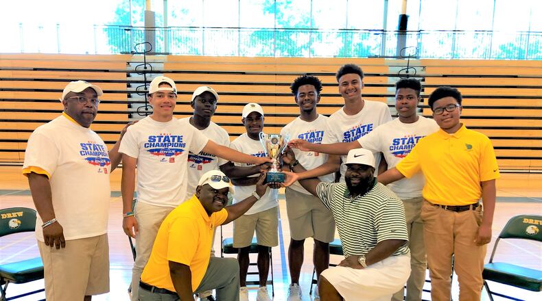 Introducing the state championship Drew Charter golf team. Kneeling: Assistant coach Jeff Dunovant and First Tee of Metro Atlanta director Nyre Williams. Standing behind them, from left to right: Head coach Joe Weems,  junior Anthony Ford, senior  Solomon Dobbs, senior Treveon McCurty, senior Christopher McCrary, junior Connor Mason, freshman Miles Richardson,  sophomore Jalon Cook. (Photo courtesy Drew Charter School)