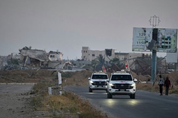 Red Cross vehicles carrying American-Israeli hostage and soldier Edan Alexander leave the Gaza Strip after he was handed over to the organization, Monday, May 12, 2025. (AP Photo/Abdel Kareem Hana)