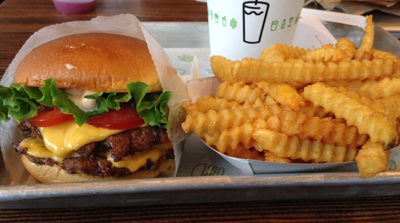 A double ShackBurger, fries and a Fair Shake milkshake at Shake Shack. (Credit: John Kessler)