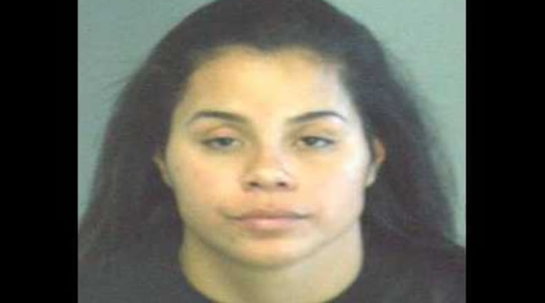 Audrey Francisquin is accused of posting nude photos of a coworker to Instagram and Snapchat in DeKalb County.