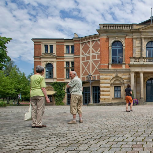 FILE - Visitors walk the grounds of the festival opera house "Festspielhaus" in Bayreuth, southern Germany, on July 17, 2010. (Eckehard Schulz/DAPD via AP)