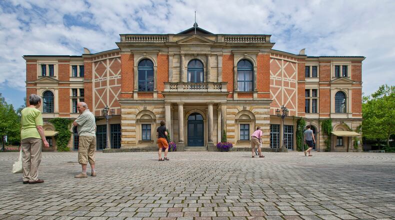 FILE - Visitors walk the grounds of the festival opera house "Festspielhaus" in Bayreuth, southern Germany, on July 17, 2010. (Eckehard Schulz/DAPD via AP)