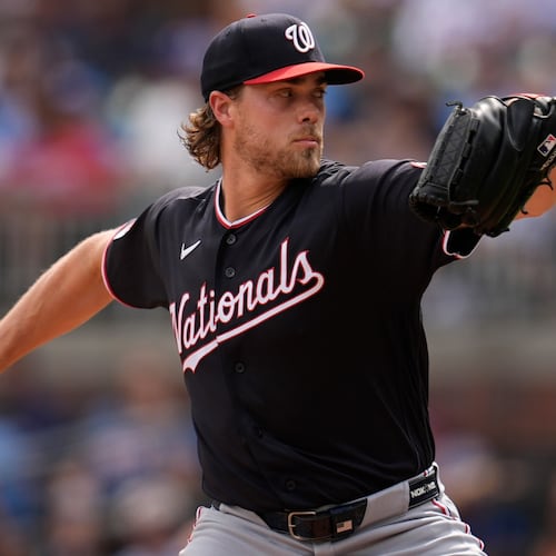 Washington Nationals pitcher Jake Irvin works in the first inning of a baseball game against the Atlanta Braves, Saturday, May 23, 2026, in Atlanta. (AP Photo/Mike Stewart)