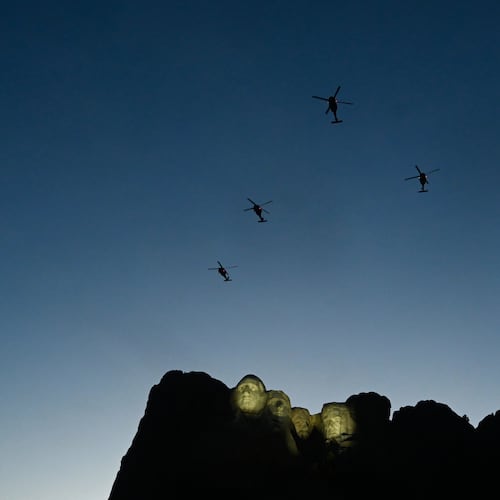 FILE - UH-60 Black Hawk helicopters perform a flyover as Interior Secretary Doug Burgum speaks before President Donald Trump at Mount Rushmore National Memorial, July 3, 2026, near Keystone, S.D. (AP Photo/Matt Gade, File)
