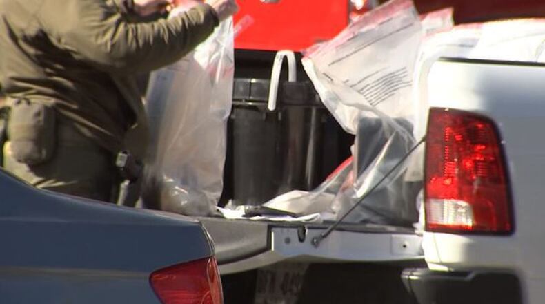 Authorities found drugs, weapons and money at a Brookhaven apartment complex Tuesday.