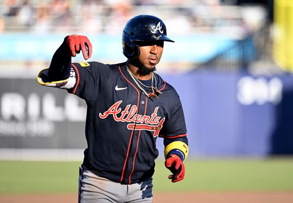 Atlanta Braves' Ozzie Albies rounds the bases after his home run during the eighth inning of a baseball game against the Tampa Bay Rays, Saturday, April 12, 2025, in Tampa, Fla. (AP Photo/Jason Behnken)