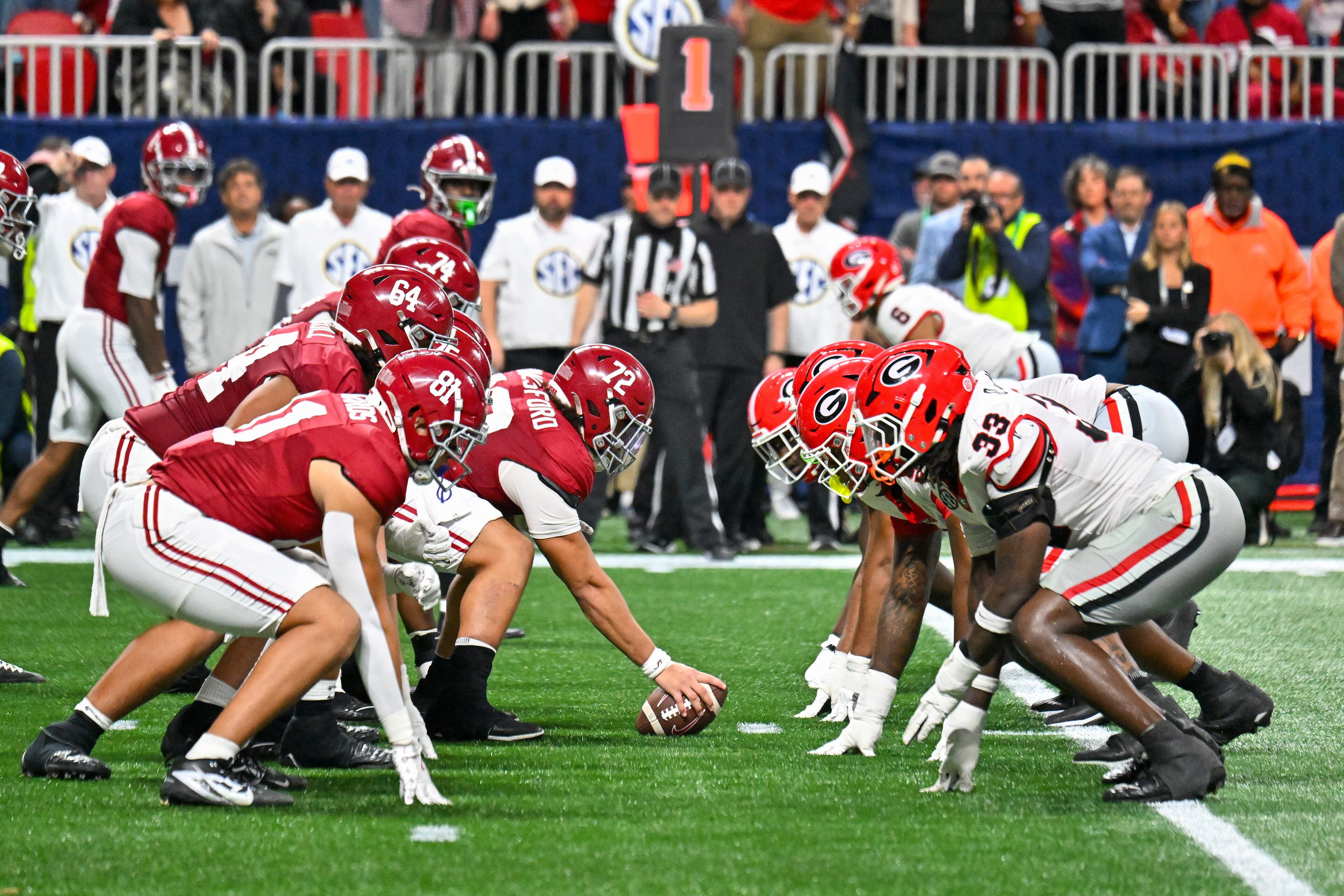 Alabama and Georgia line up during the fourth quarter of the SEC Championship game at Mercedes-Benz Stadium, Saturday, Dec. 6, 2025, in Atlanta. (Hyosub Shin / AJC)