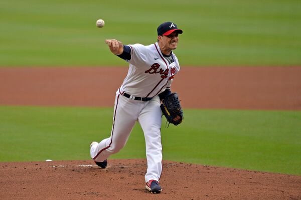 Atlanta Braves' Charlie Morton pitches in the first inning of a baseball game against the Washington Nationals, Saturday, Aug. 7, 2021, in Atlanta. (AP Photo/Edward Pio Roda)