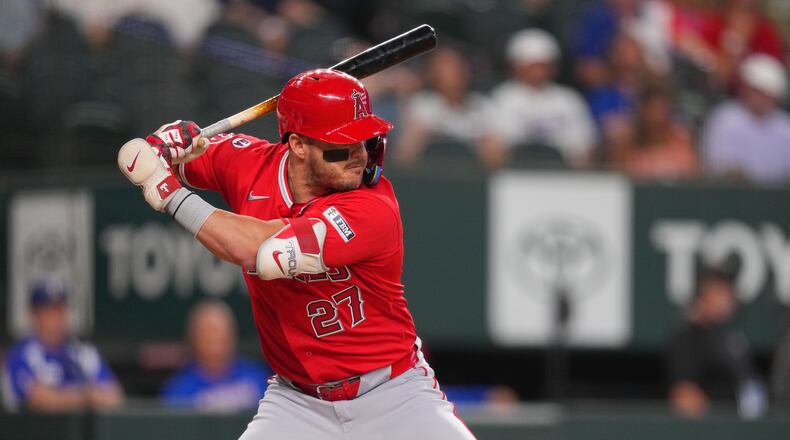 Los Angeles Angels designated hitter Mike Trout waits for a pitch from the Texas Rangers during the first inning of a baseball game, Wednesday, July 8, 2026, in Arlington, Texas. (AP Photo/Julio Cortez)