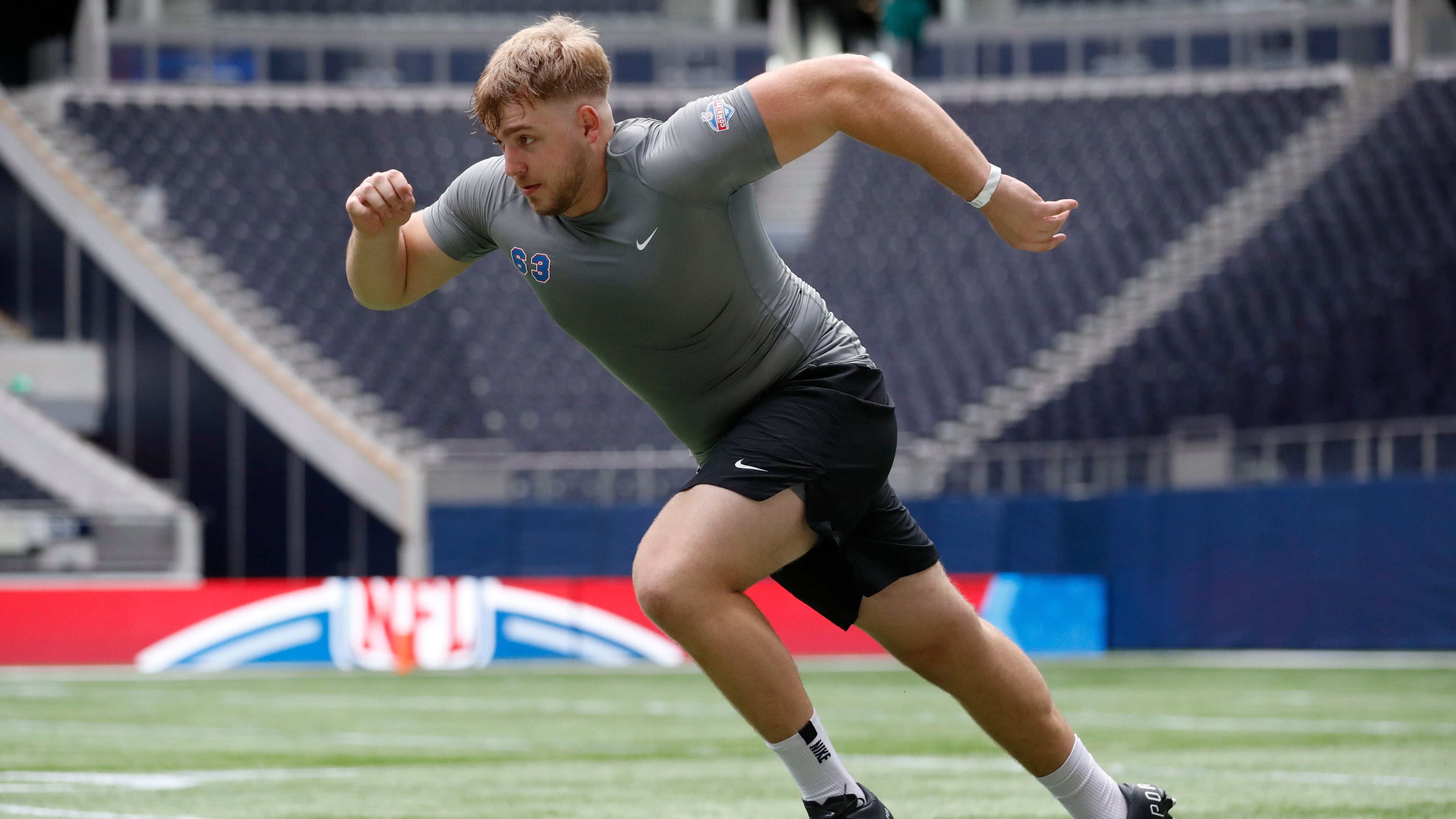 FILE - Offensive lineman Leander Wiegand, of Germany, participates in a drill at the NFL international scouting combine at Tottenham Hotspur Stadium in London, Tuesday, Oct. 4, 2022. (AP Photo/Steve Luciano, File)