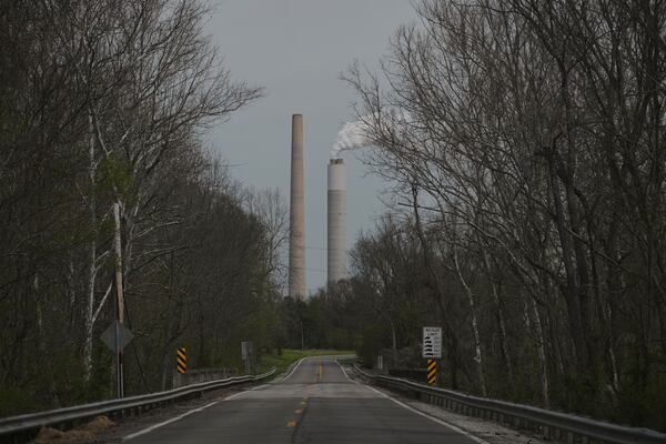 The Kyger Creek Power Plant, a coal-fired power plant, operates Monday, April 14, 2025, near Cheshire, Ohio. (AP Photo/Joshua A. Bickel)