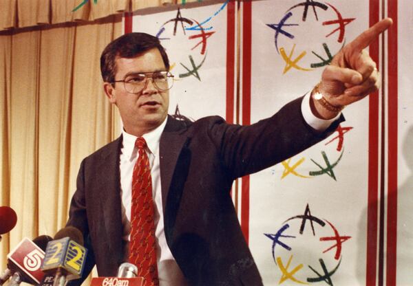 AOC President Billy Payne talks to the press about where Atlanta stands in its race for the Olympics in 1990. (Dwight Ross Jr./AJC 1990)