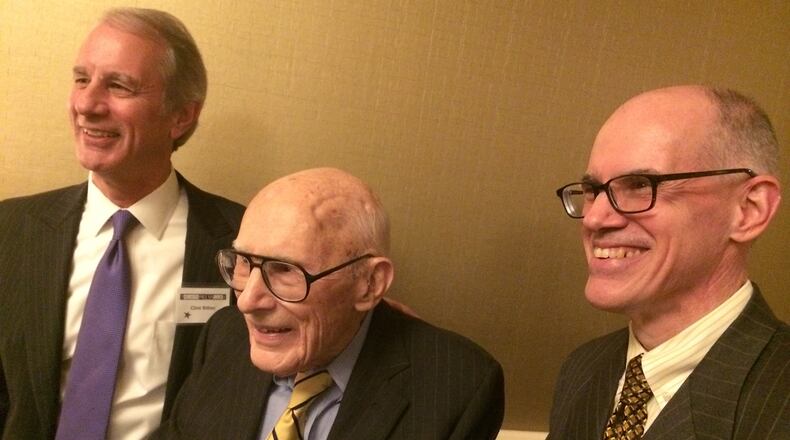 Claude Sitton, center, with sons Clint, left and Mac in November when Sitton was inducted into the Atlanta Press Club's Hall of Fame. BO EMERSON/bo.emerson@ajc.com