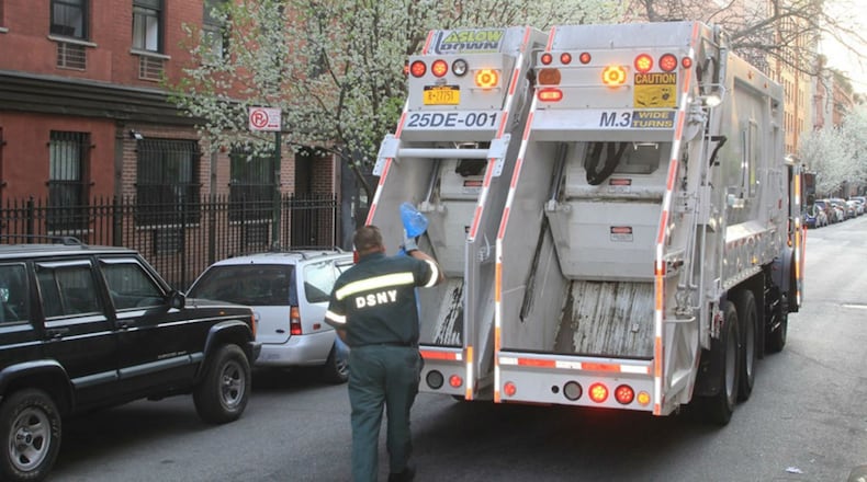 FILE PHOTO:  A sanitation worker was injured after a helium tank exploded in the back of his truck Friday morning in Brooklyn. (Photo: New York City Department of Sanitation)