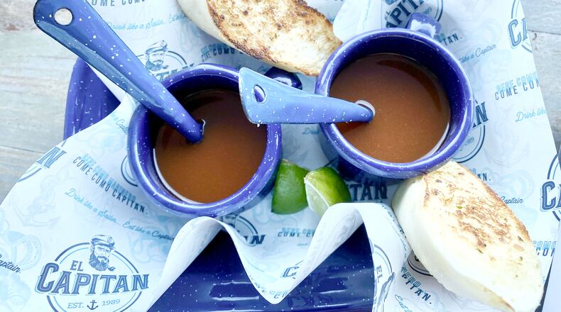 Mexican seafood restaurant El Capitan greets guests with a cup of hot shrimp broth and a slice of grilled bread. Ligaya Figueras/ligaya.figueras@ajc.com